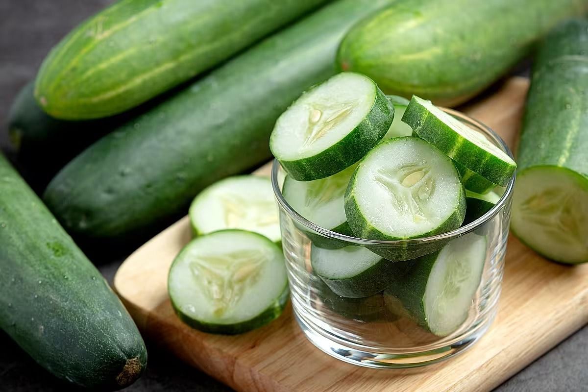 Eating cucumber at night (Image via Getty Images)