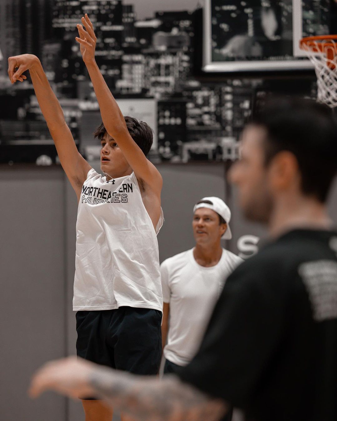 Brady and his son Jack shooting hoops