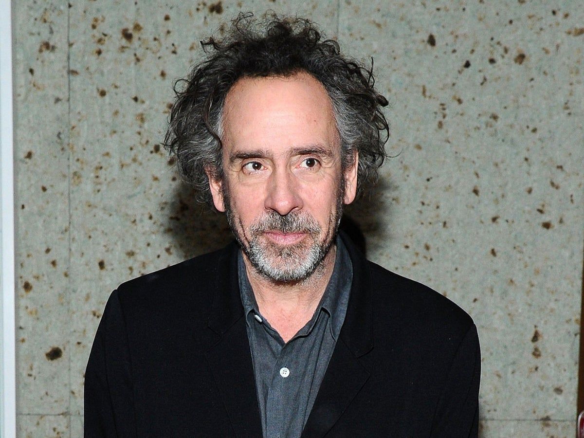 A still of Tim Burton (Image via Ilya S. Savenok/Getty Images for FIJI Water)