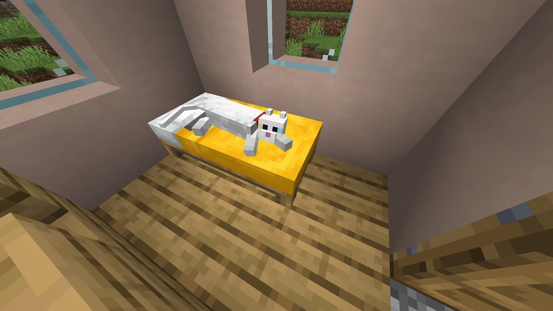 A cat lounges and purrs on a bed block in Minecraft.