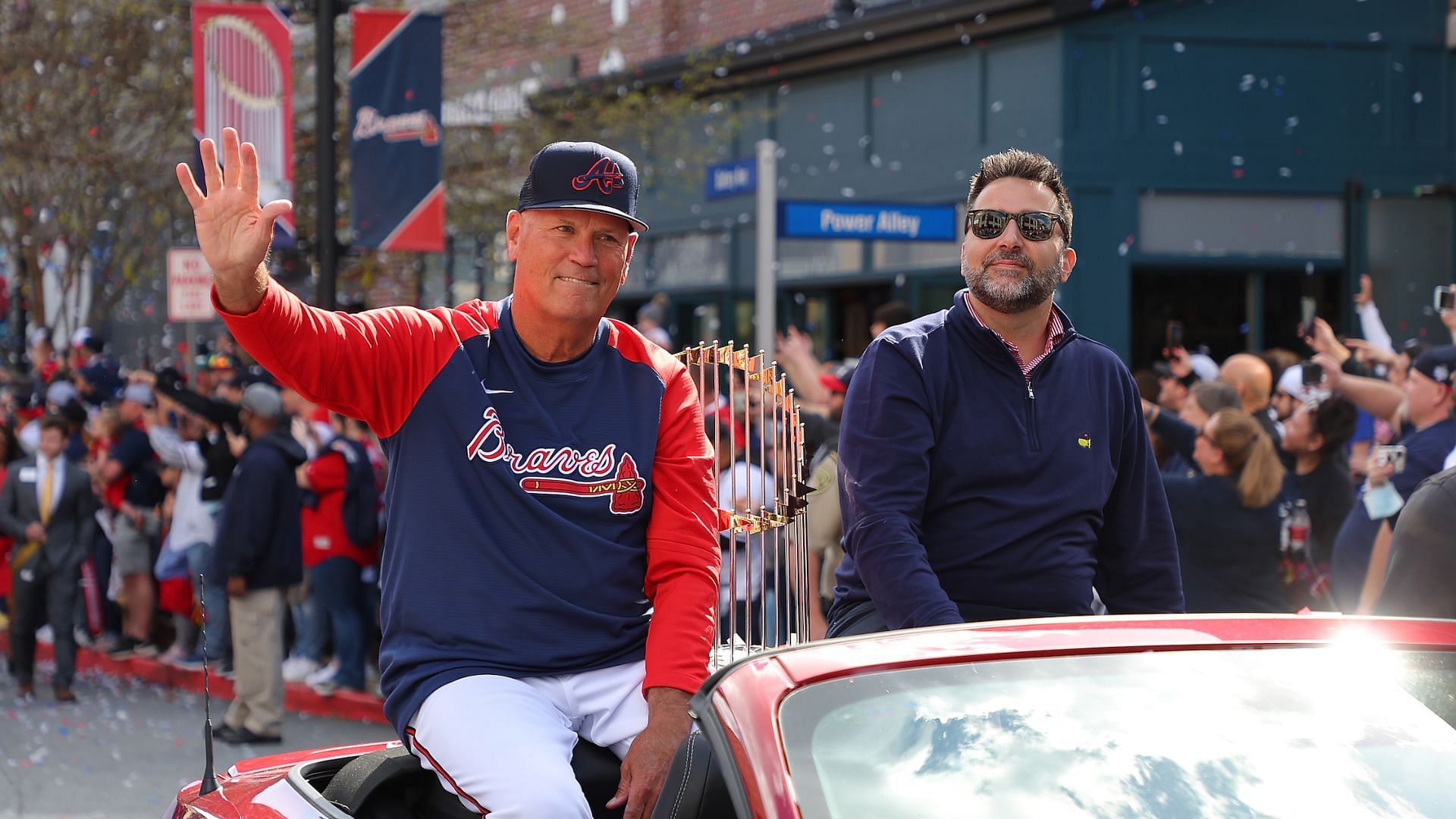 Manager Brian Snitker of the Atlanta Braves sits alongside President of Baseball Operations &amp; General Manager Alex Anthopoulos