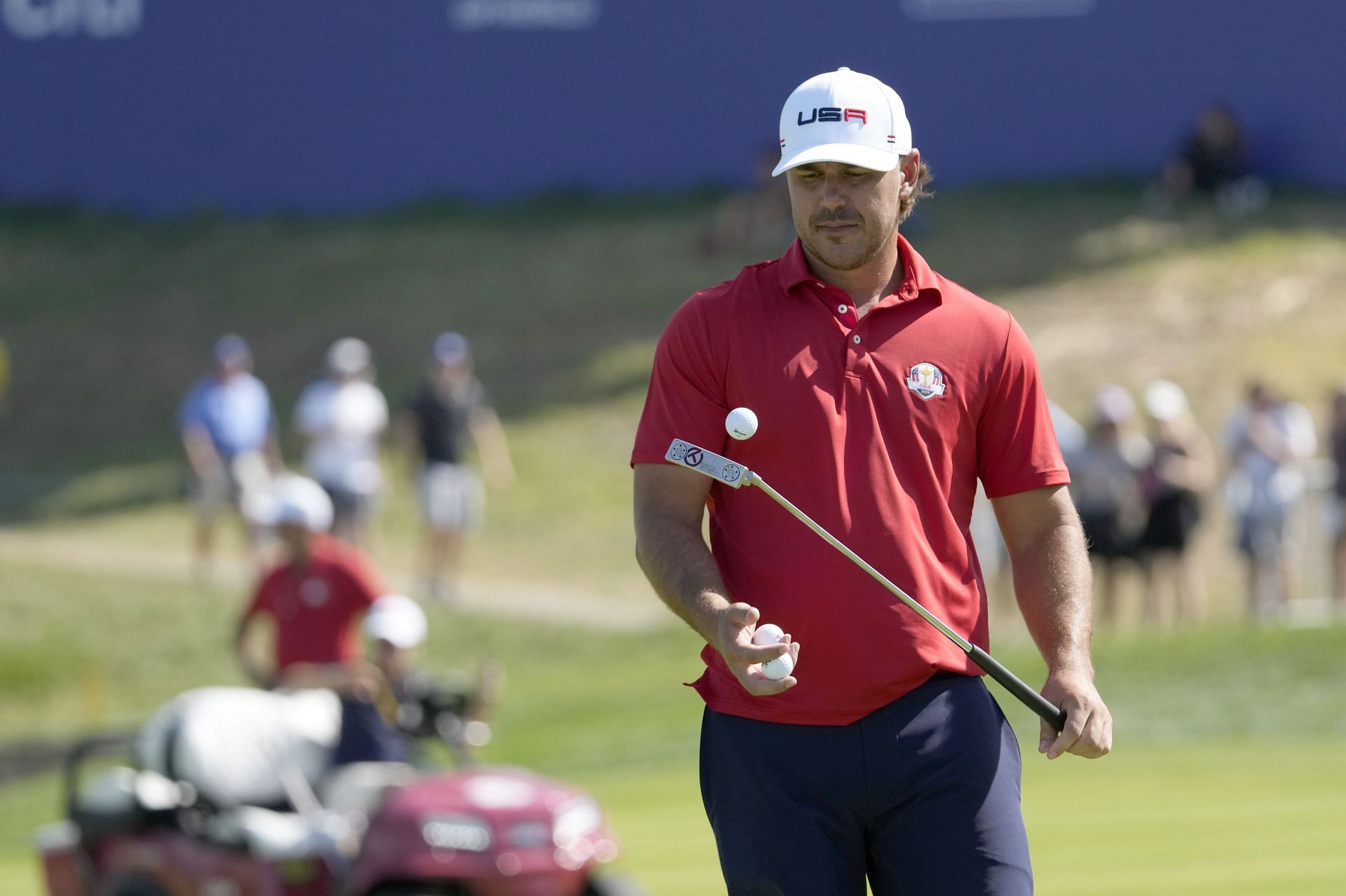 Brooks Koepka walks off the 16th green during a practice round ahead of the Ryder Cup (Image via AP Photo)