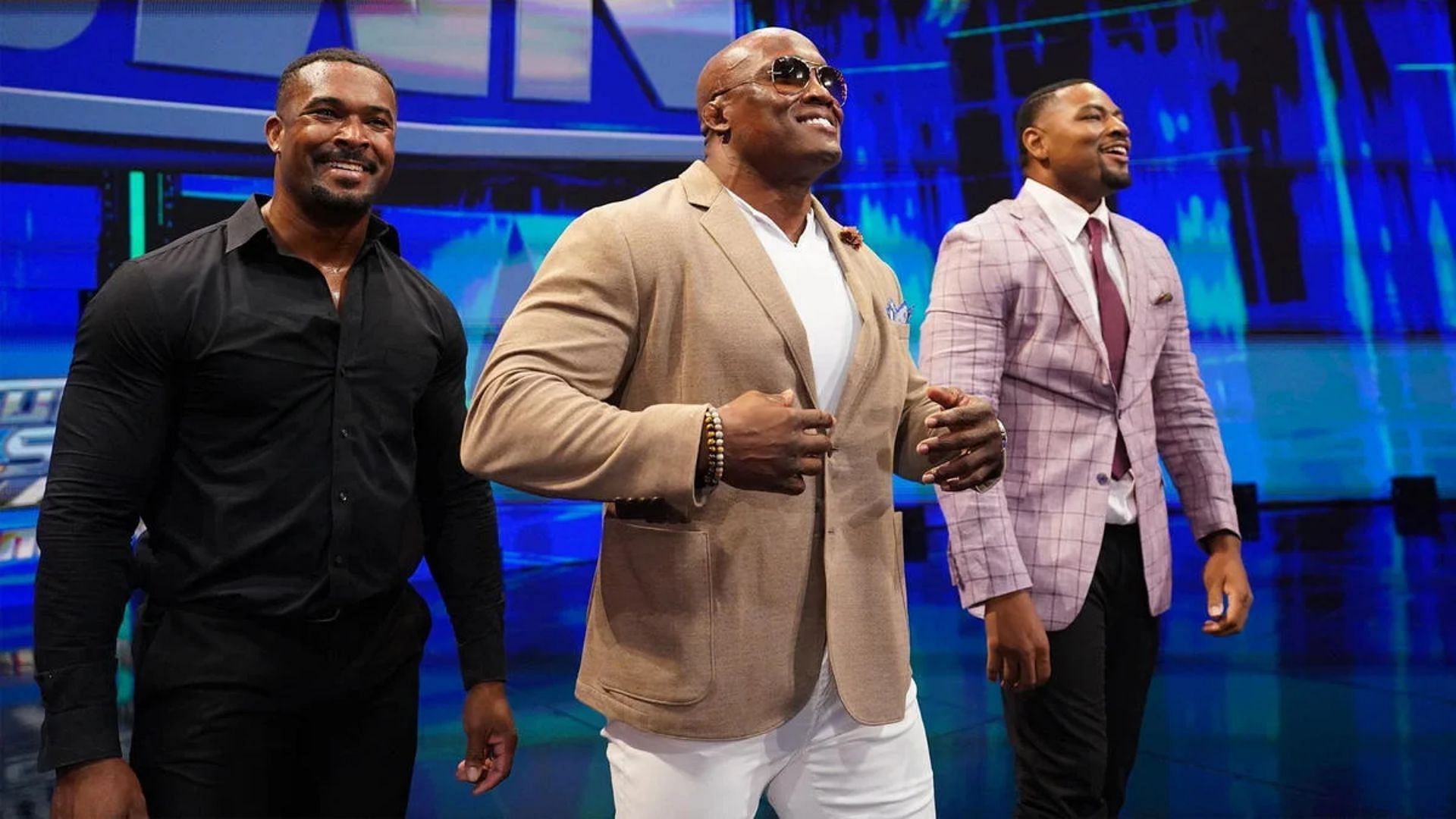 From left to right: Montez Ford, Bobby Lashley and Angelo Dawkins