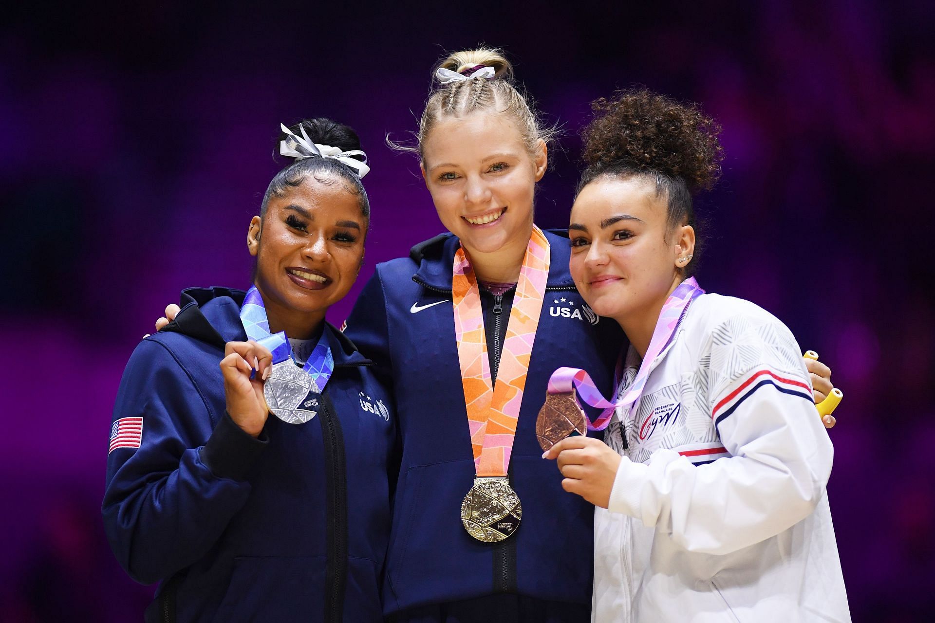 Gold medalist Jade Carey (C) of the United States, Silver medalist Jordan Chiles (L) of the United States, and Bronze medalist Coline Devillard (R) of France pose during the medal ceremony for Women&#039;s Vault Final