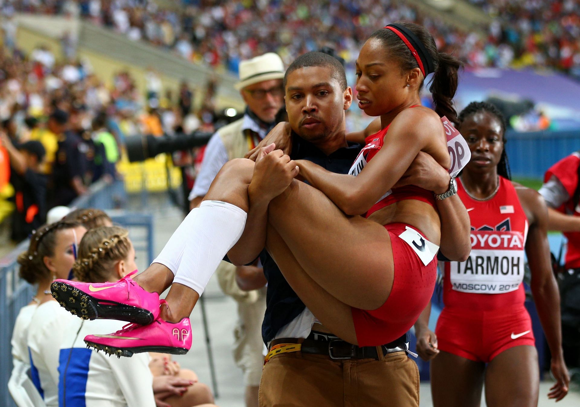 Allyson Felix being carried by her brother at the 2013 World Championships in Moscow, Russia