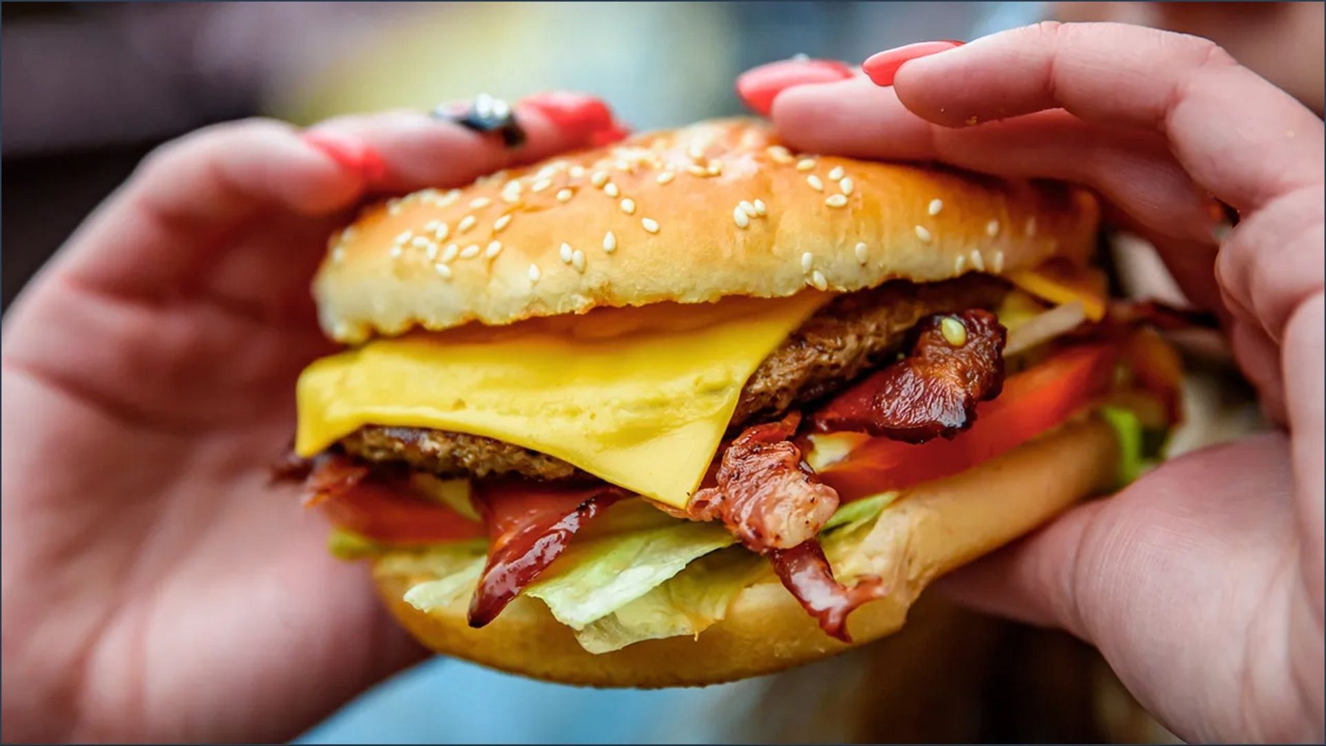 Americans show their love for cheeseburger as they celebrate the National Cheeseburger Day on September 18 (Image via Semenovp/Getty Images)