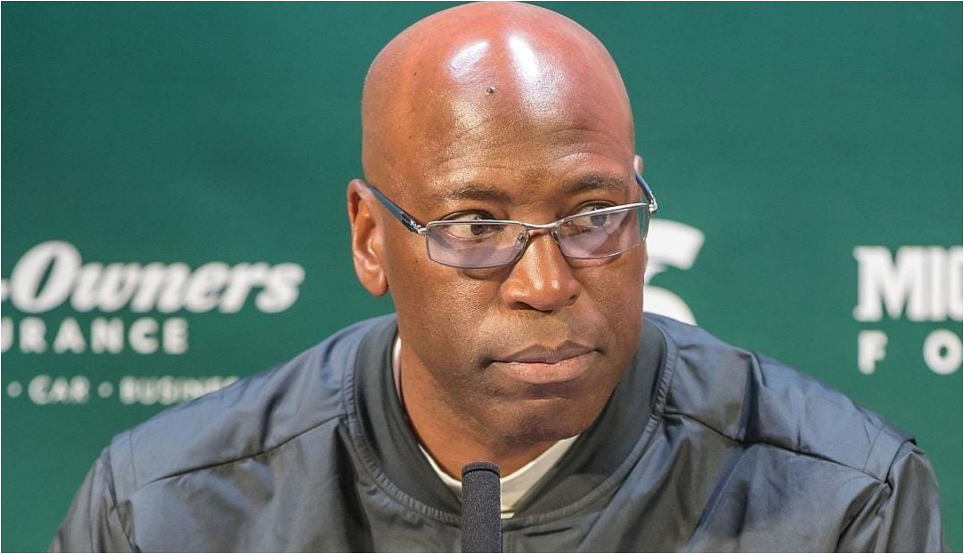 Who is Harlon Barnett, the interim head coach of the Michigan State Spartans?