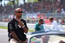 Disappointed Lewis Hamilton cheerleading for a George Russell win at the 2023 F1 Singapore GP