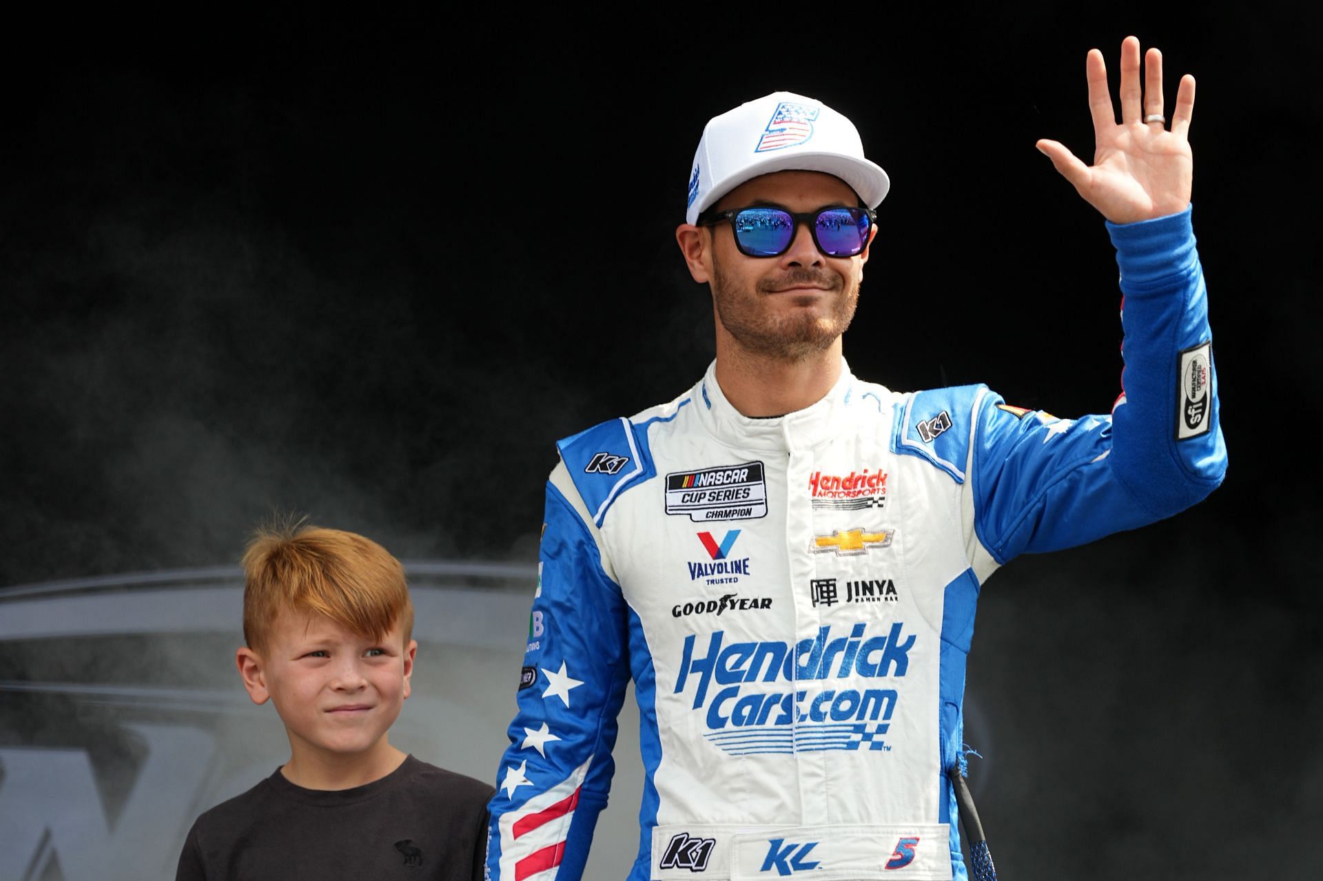 Kyle Larson and his son at Kansas