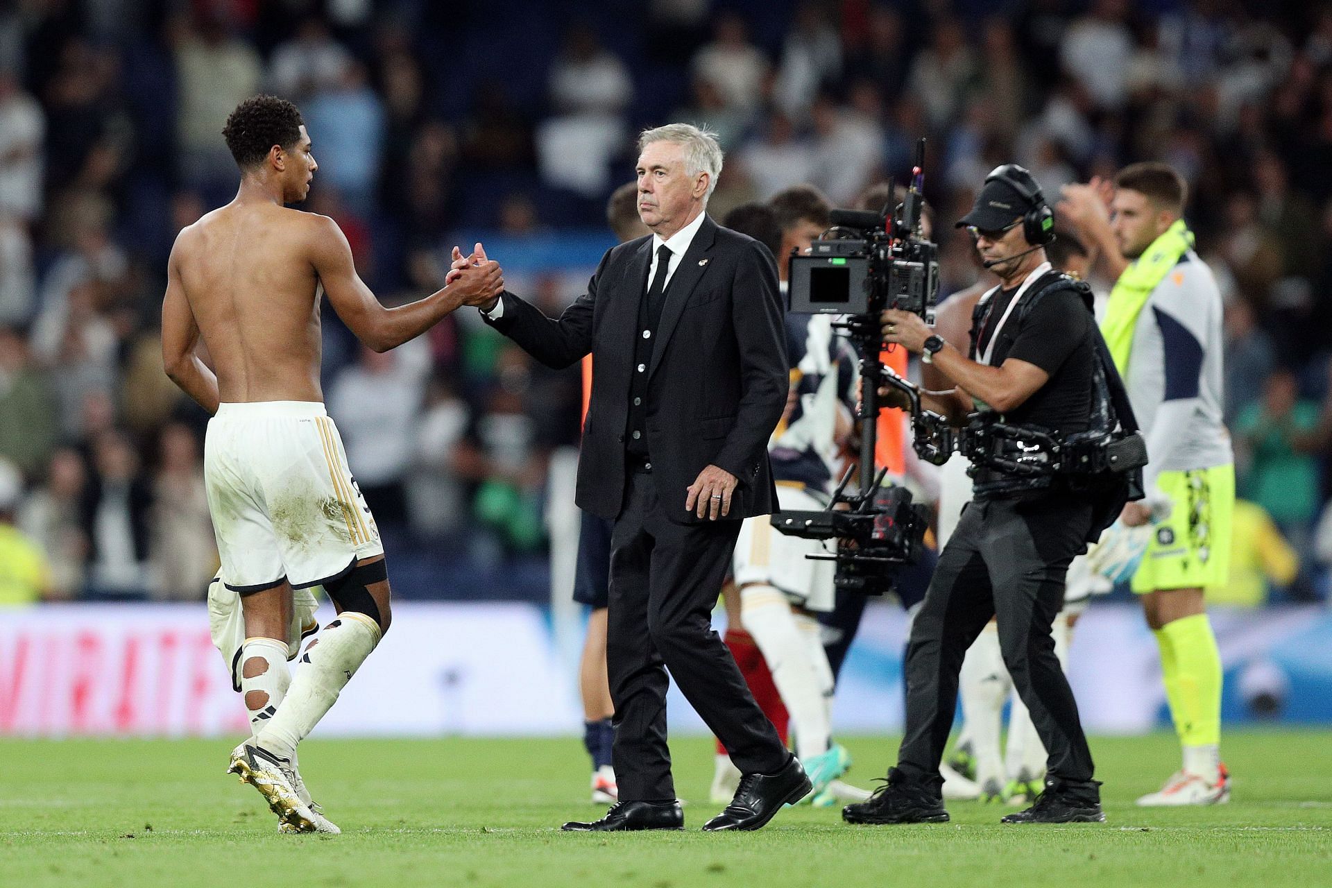 Carlo Ancelotti (centre) is delighted with Real Madrid&#039;s new midfield star.