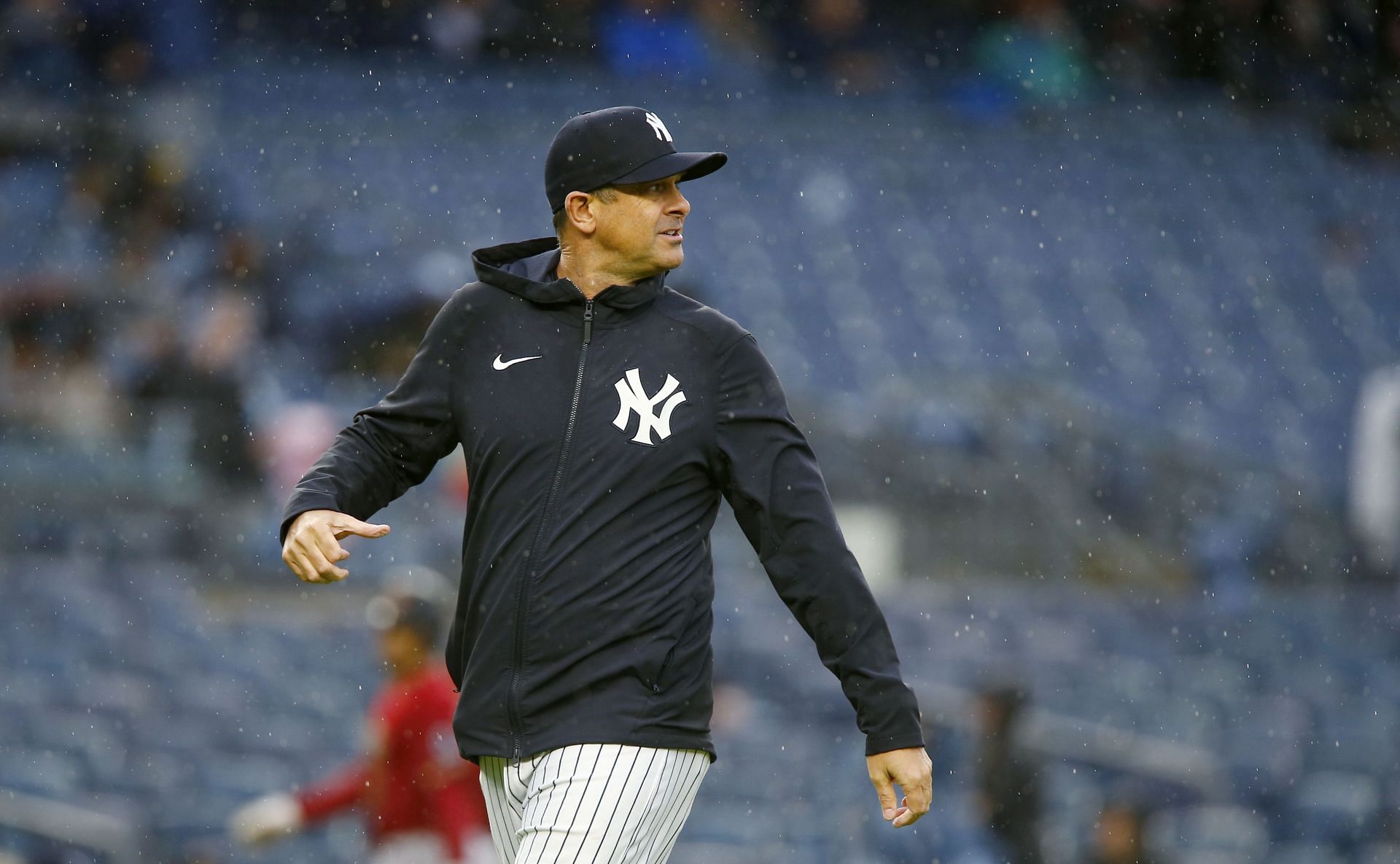 New York Yankees manager Aaron Boone walks back to the dugout against the Arizona Diamondbacks