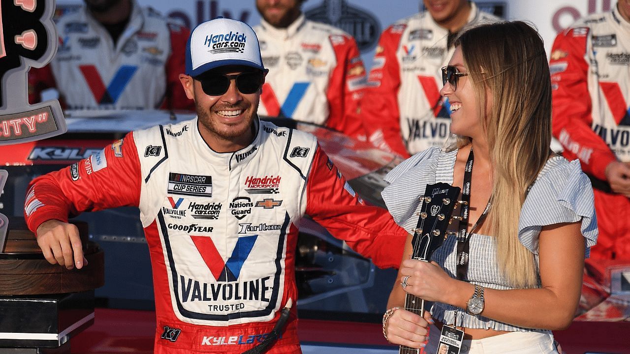 NASCAR Cup Series driver Kyle Larson (5) celebrates with his wife Katelyn after winning the Ally 400 at Nashville Superspeedway. Mandatory Credit: Christopher Hanewinckel-USA TODAY Sports