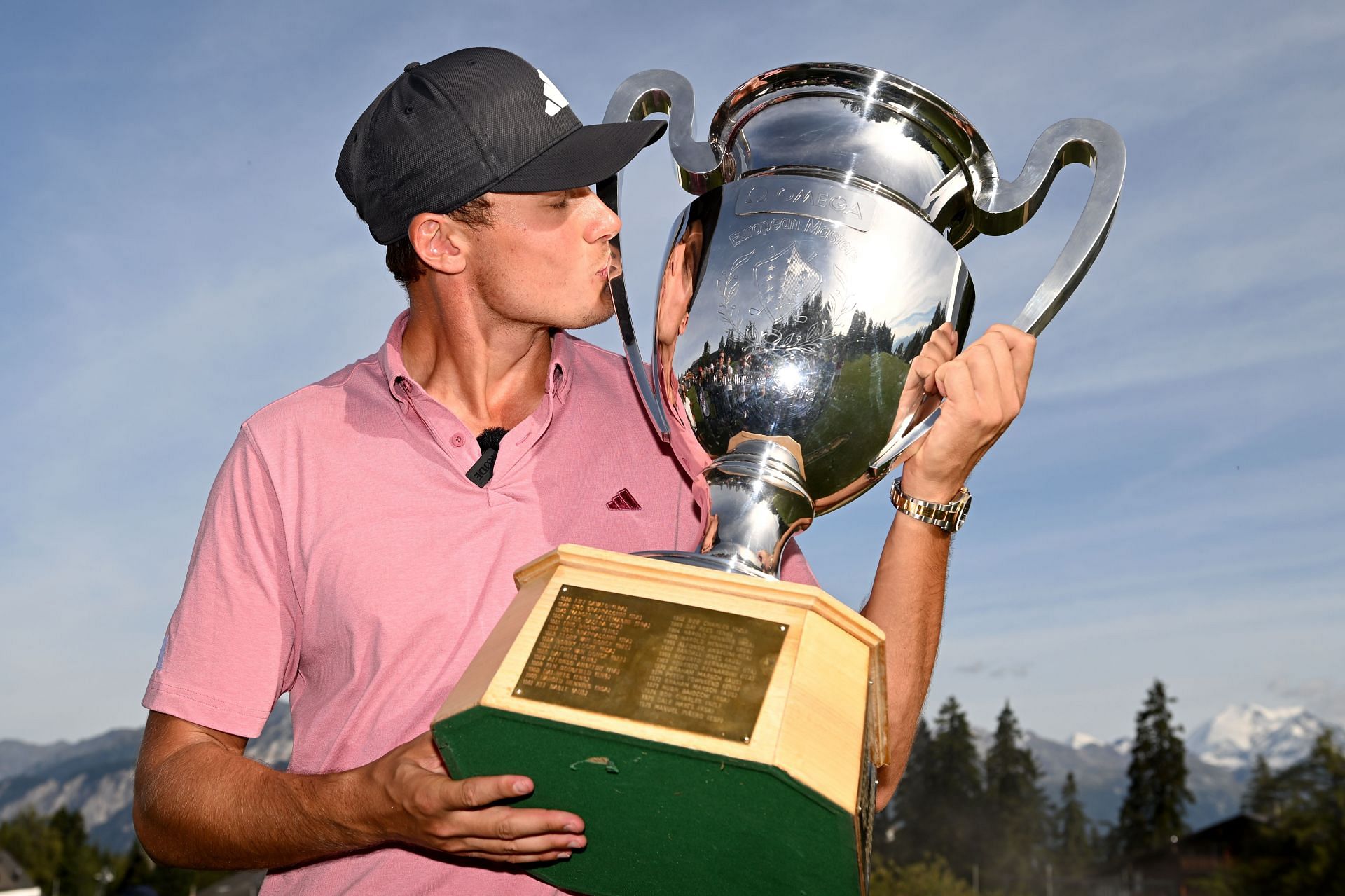 Ludvig Aberg of Sweden poses with the Omega European Masters trophy (Image via Getty)