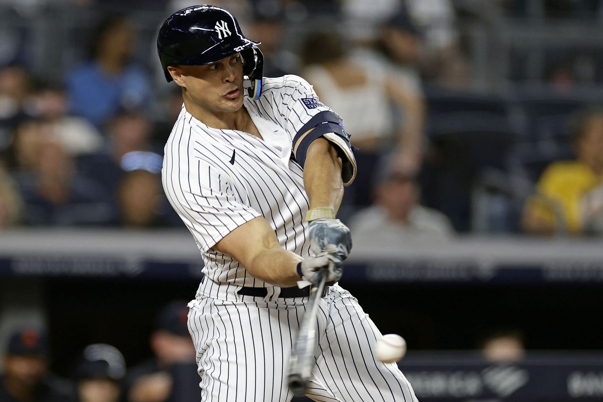 New York Yankees designated hitter Giancarlo Stanton hits a two-run home run against the Detroit Tigers at Yankee Stadium