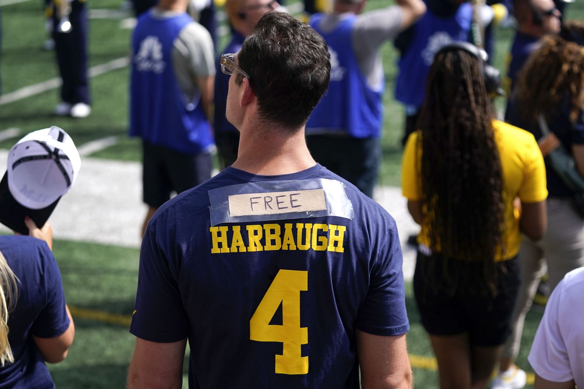 Jim Harbaugh is serving a three-game suspension.