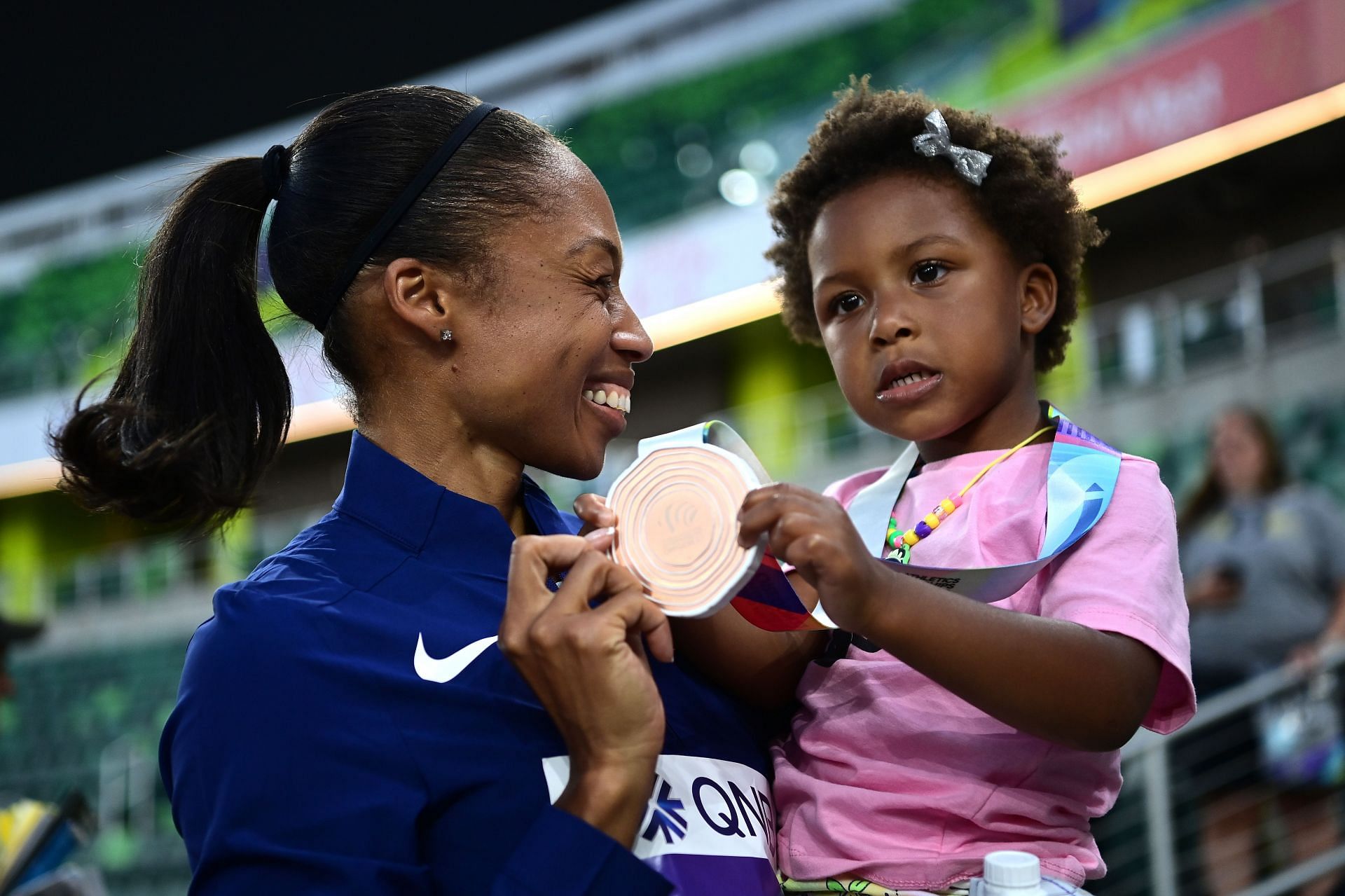 Felix with her daughter at World Athletics Championships Oregon22 - Day One