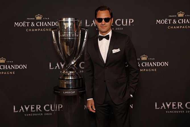 "Try to wear the suit, and not let the suit wear you" - Roger Federer's advice for posing on red and black carpets
