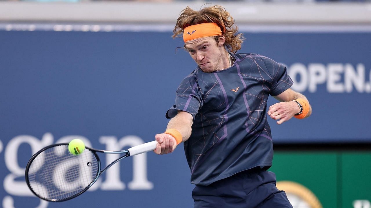 Rublev swats a forehand against Gael Monfils at the 2023 US Open