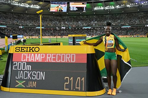 Shericka Jackson celebrates after winning the women's 200m at the 2023 World Athletics Championships in Budapest, Hungary