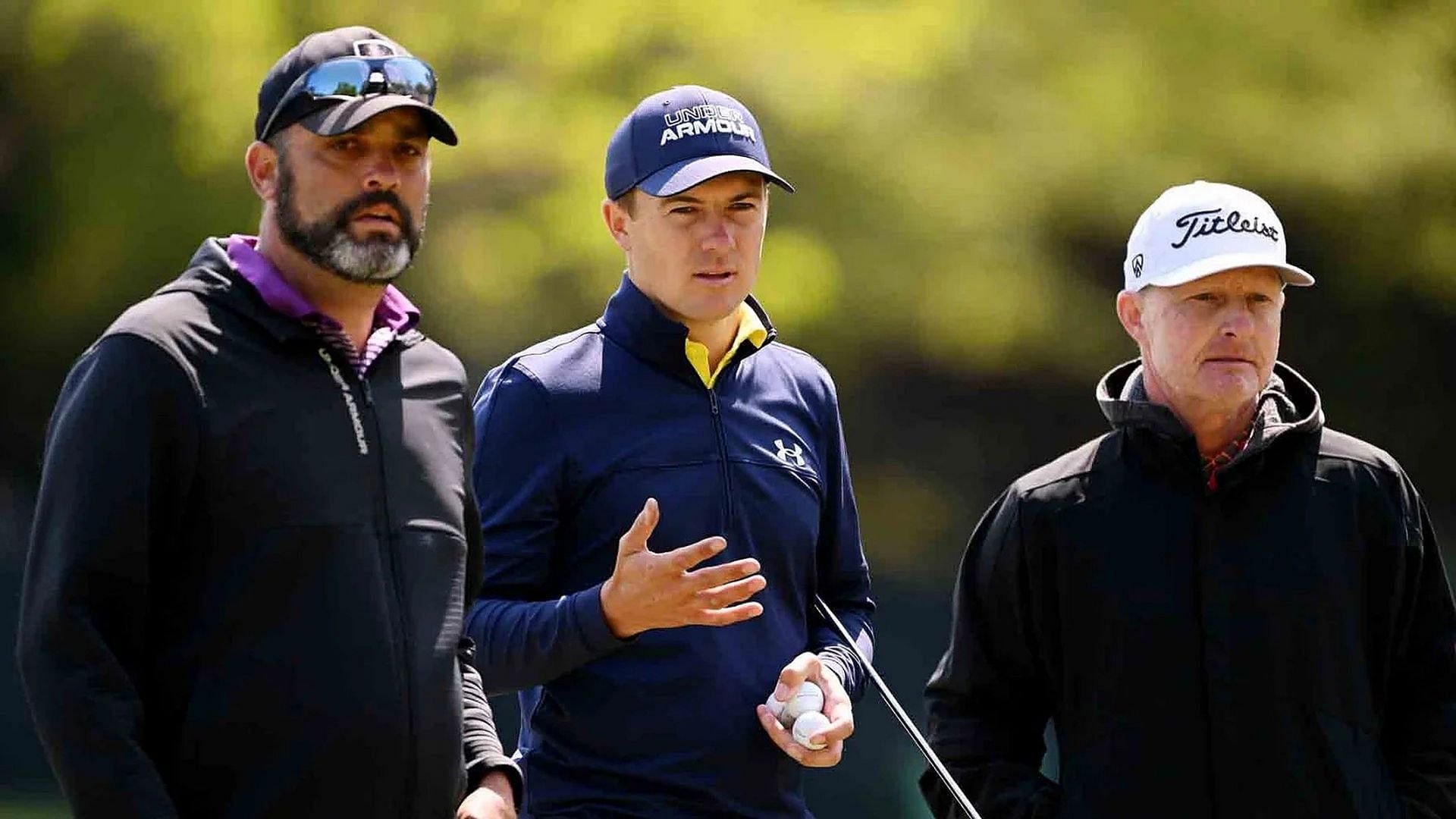 Jordan Spieth, center; his caddie, Michael Greller, left; and his coach, Cameron McCormick, in May.