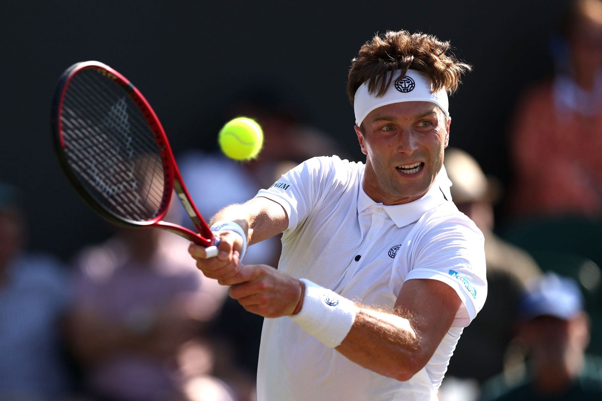 Liam Broady in action at the 2023 Wimbledon Championships.