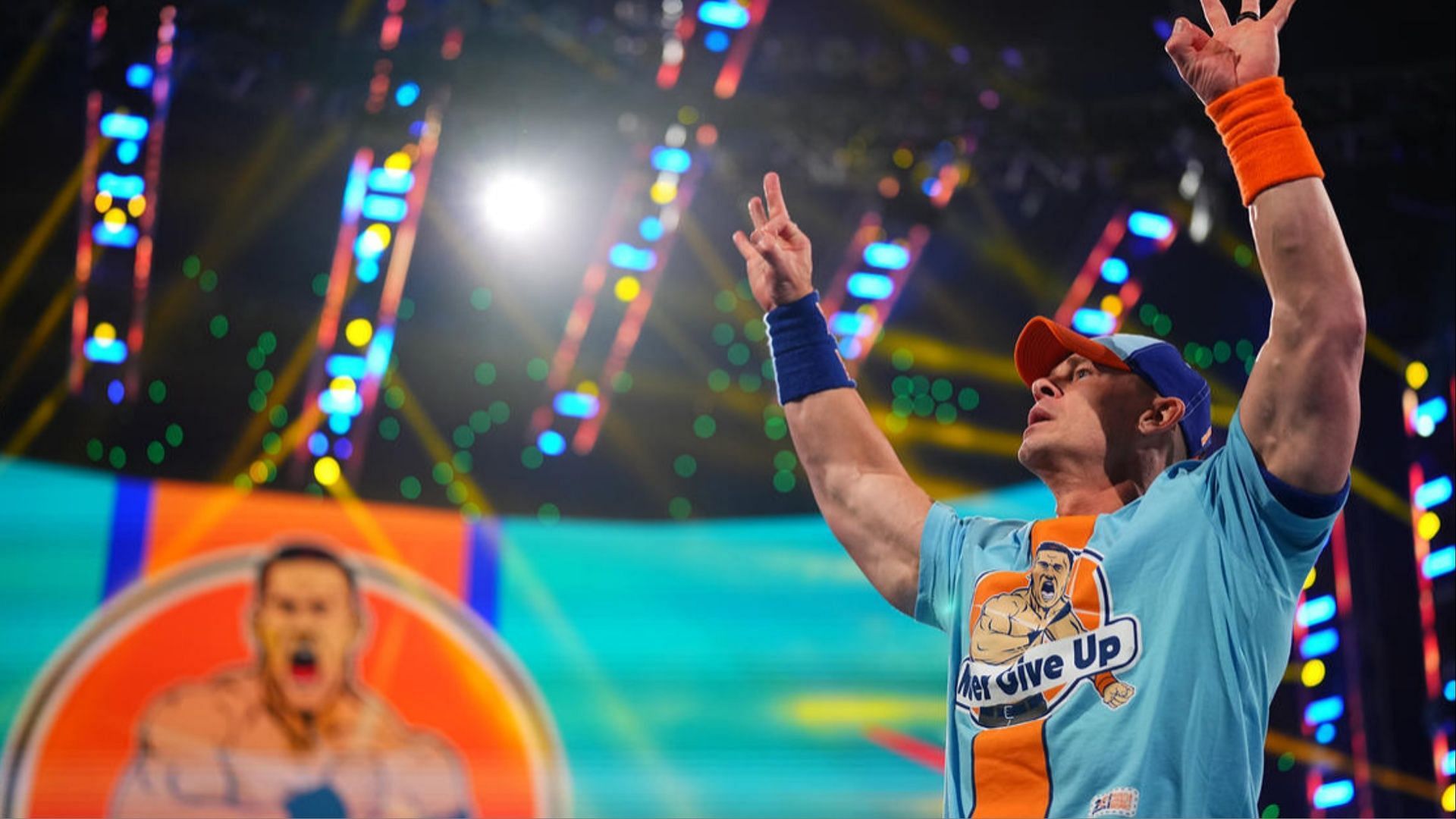 John Cena poses during his entrance on WWE SmackDown.