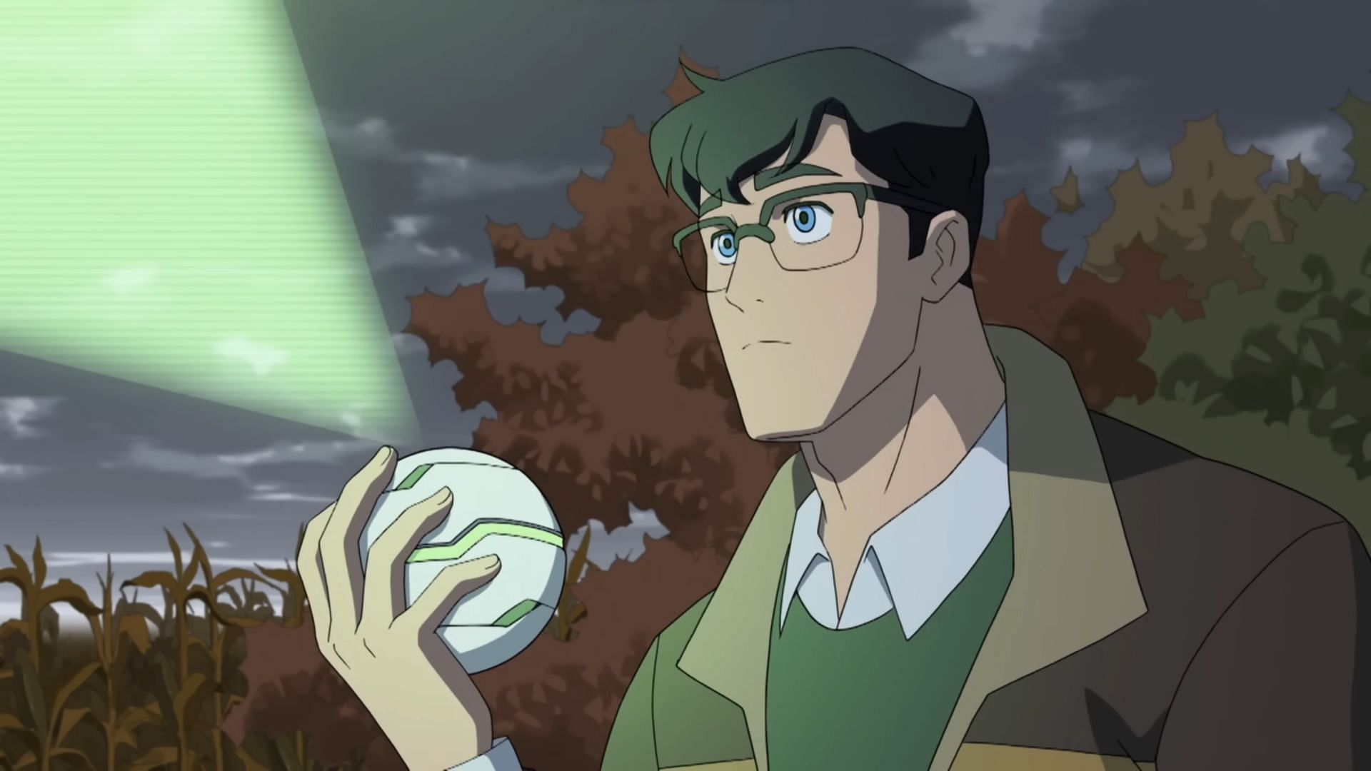 Clark opens the data sphere containing the Kryptonite, and the green glow of the mineral fills the screen. (Image via Adult Swim)