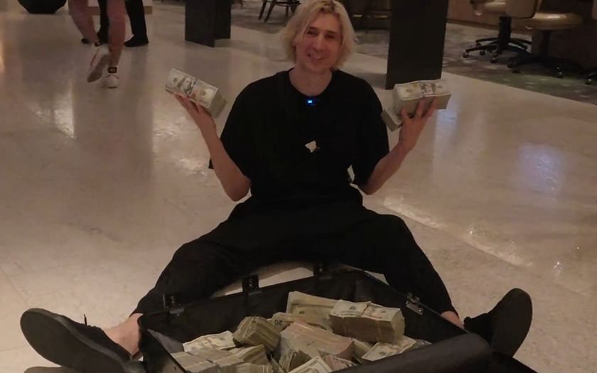 "Definition of the rich get richer" xQc flaunting suitcase full of