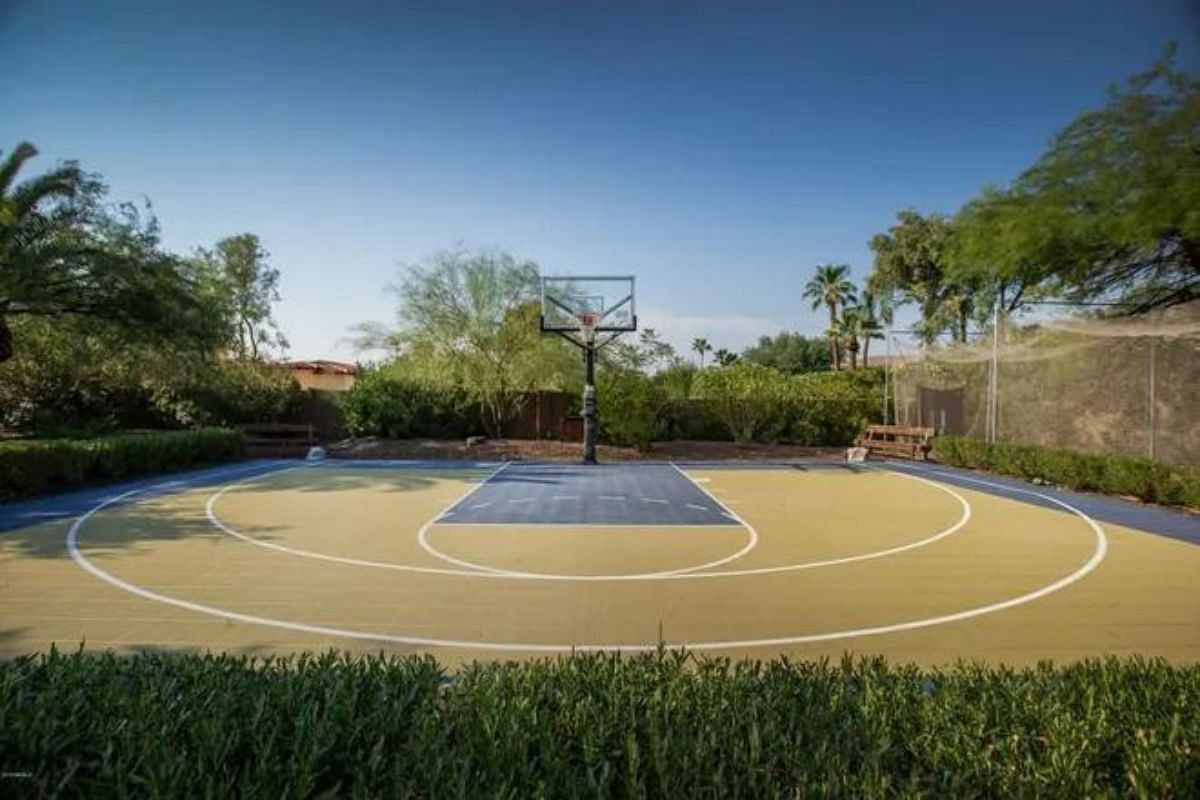 Hicks has an outdoor basketball court in his backyard