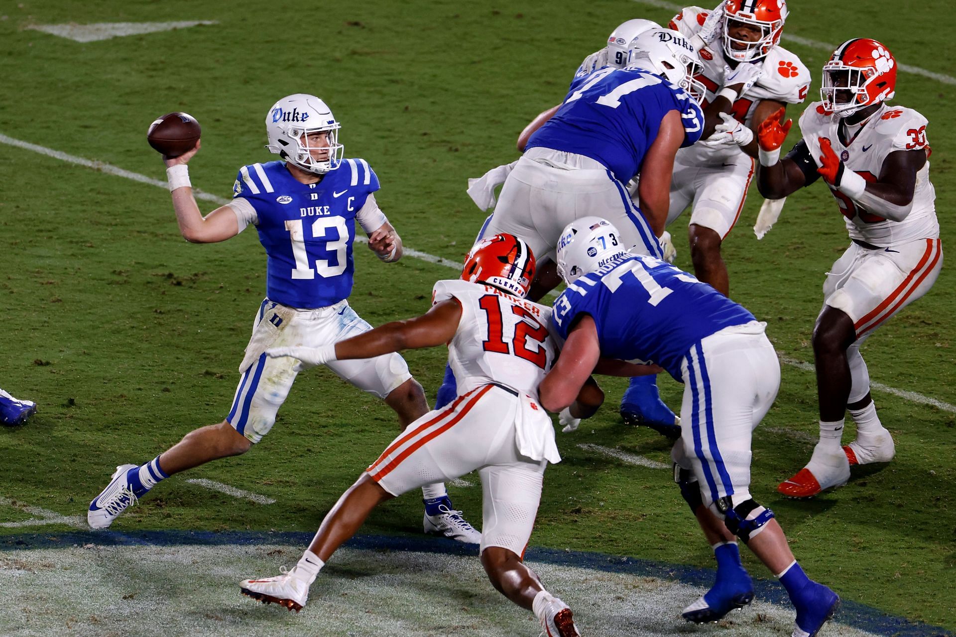 Clemson v Duke: DURHAM, NORTH CAROLINA - SEPTEMBER 04: Riley Leonard #13 of the Duke Blue Devils drops back to pass against the Clemson Tigers during the first half of the game at Wallace Wade Stadium on September 4, 2023 in Durham, North Carolina. (Photo by Lance King/Getty Images)
