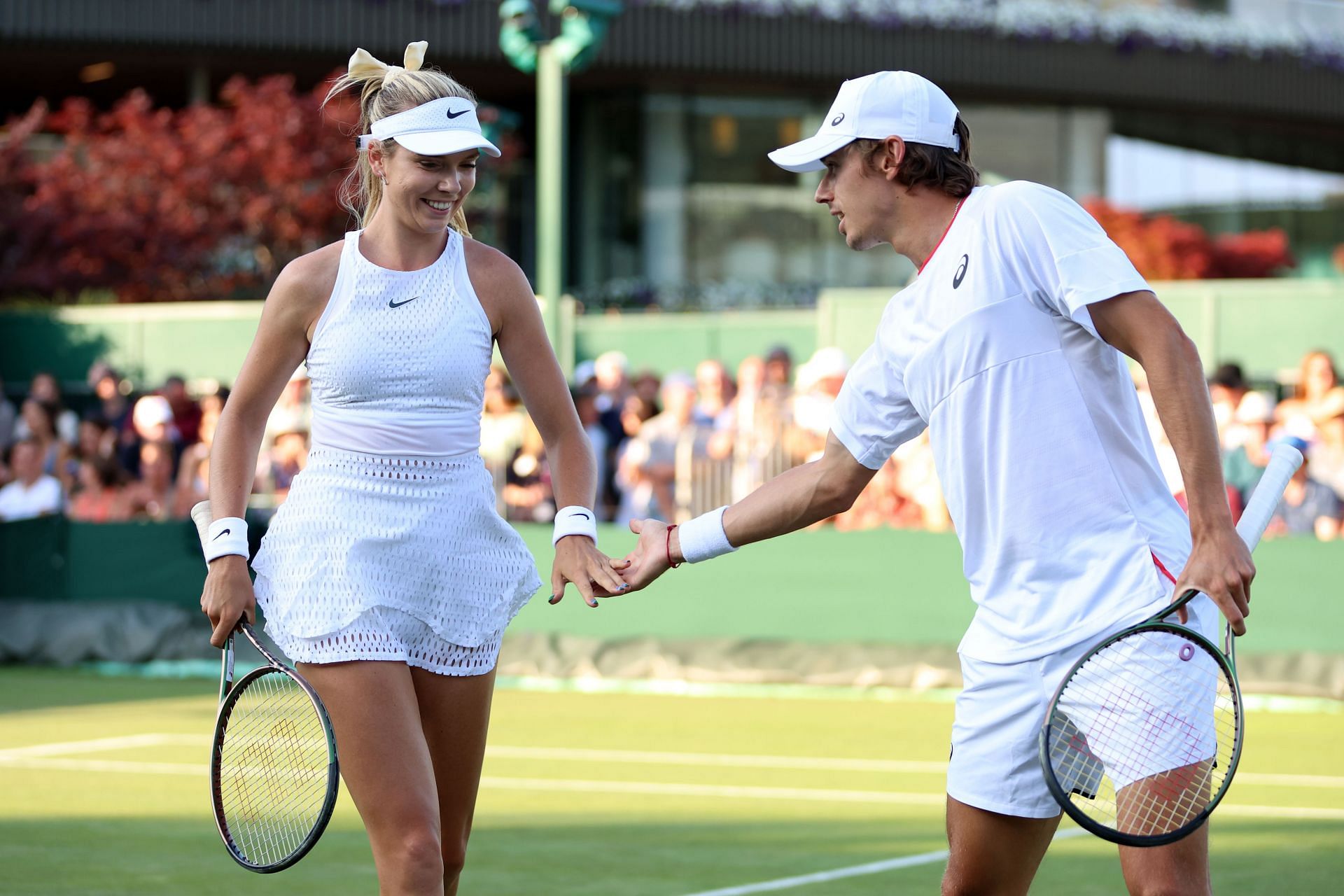 Alex de Minaur and Katie Boulter playing mixed doubles at the 2023 Wimbledon Championships