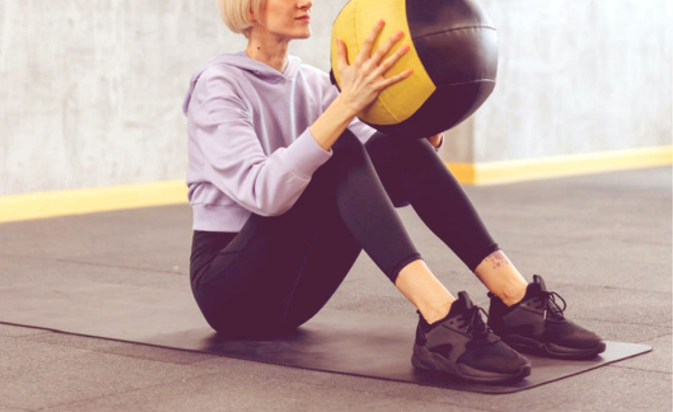 Stability ball knee lifts. (Image credits: Freepik)