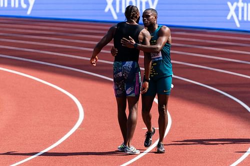 Christian Coleman and Noah Lyles congratulate each other after the Men's 100m event in Eugene, Oregon.