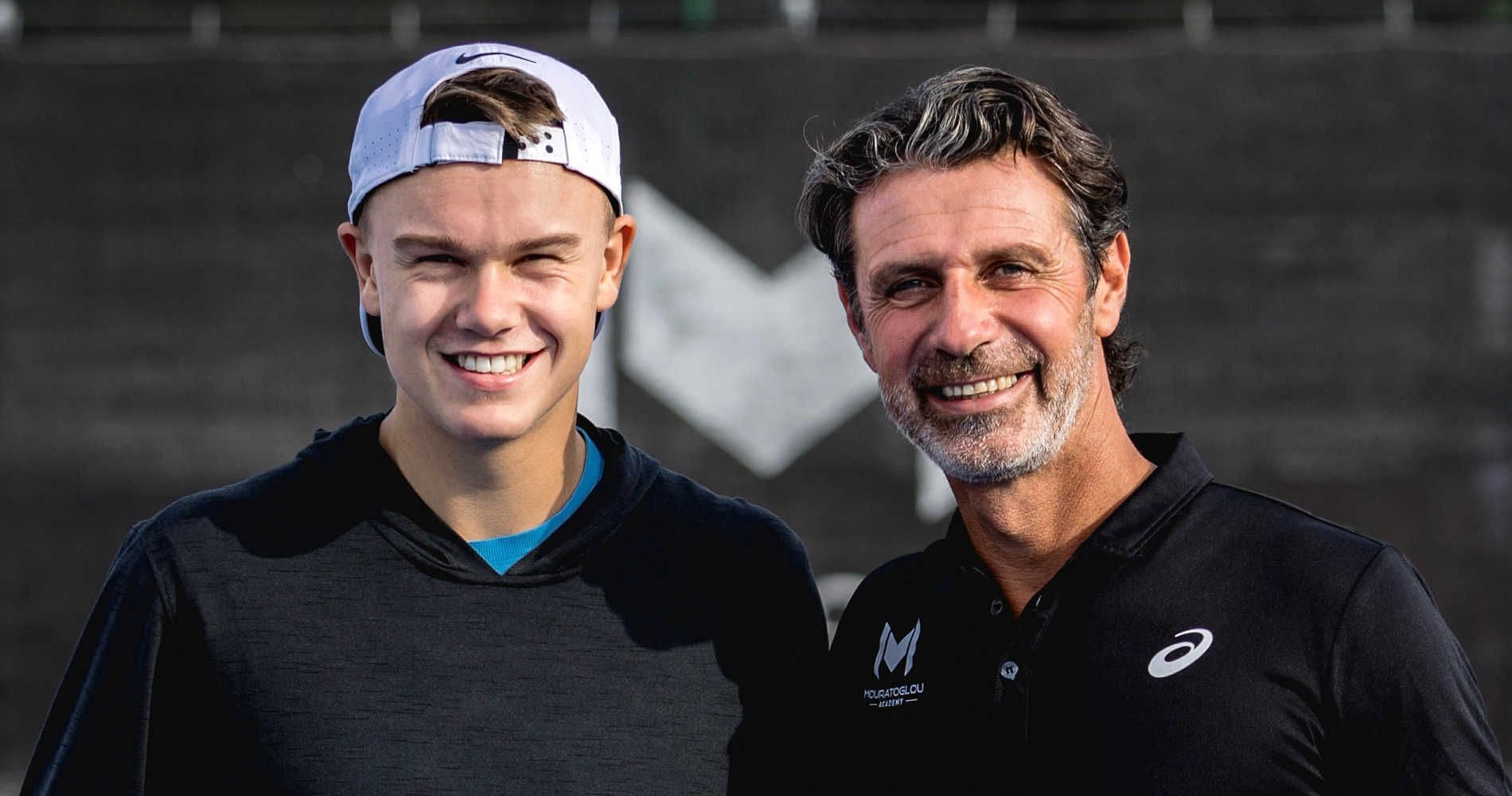 Holger Rune poses with Patrick Mouratoglou