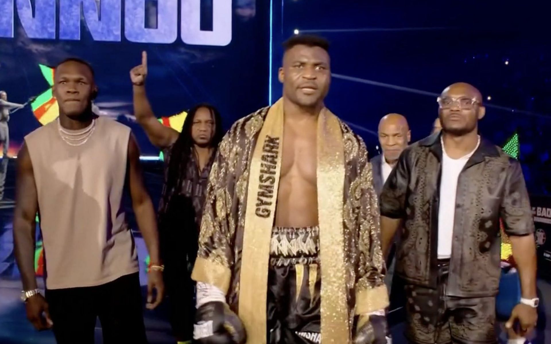 Israel Adesanya and Kamaru Usman walking-out with Francis Ngannou at the &quot;Battle of the Baddest&quot; [via: @MMAHistoryToday]