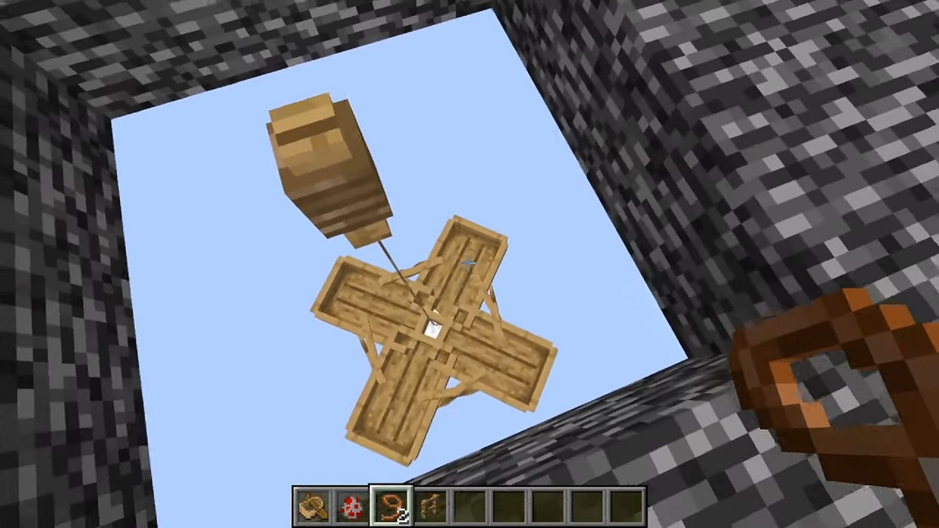 The right placement of blocks can create a starting point for building under bedrock (Image via Decapit8/YouTube)