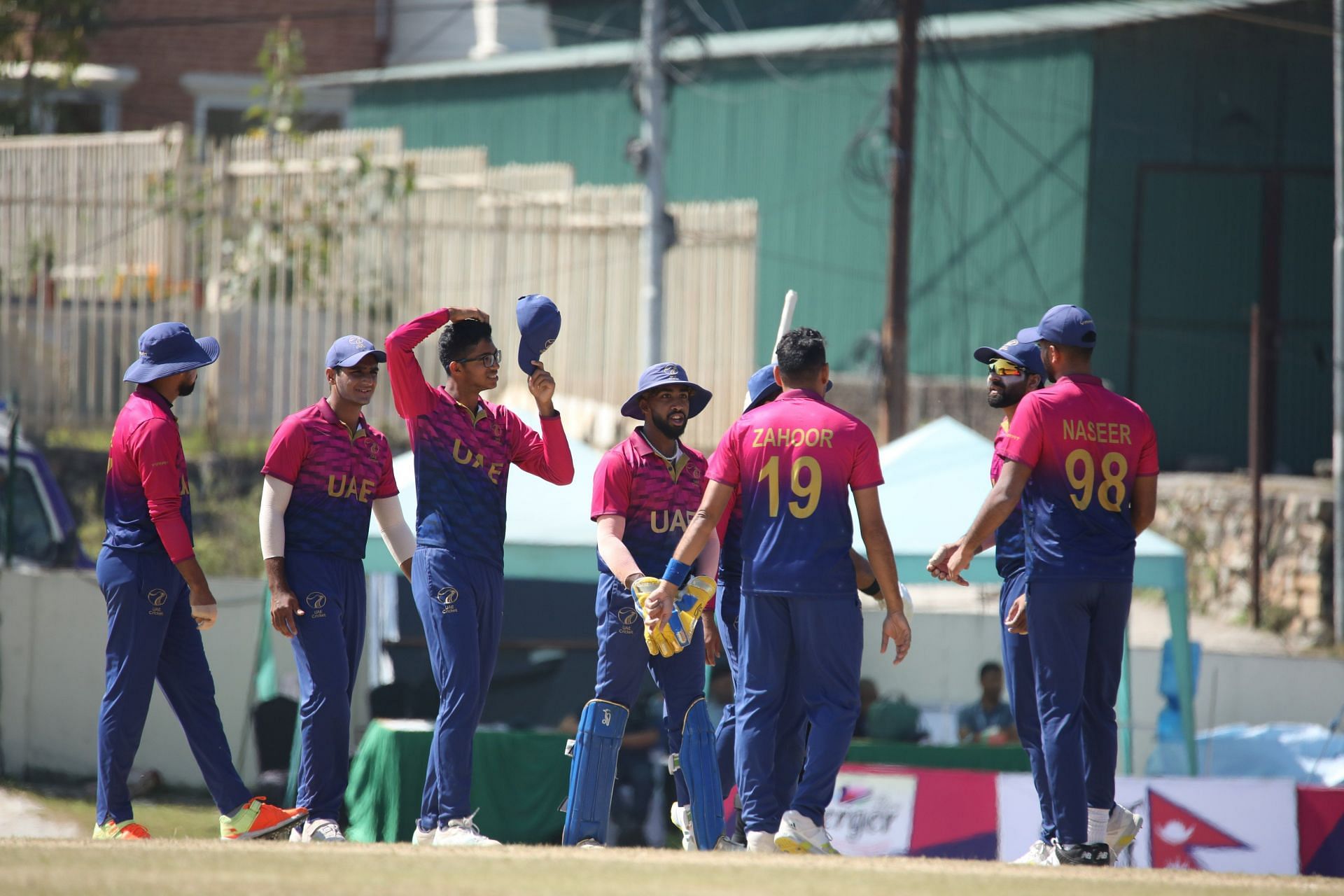 UAE Cricket Team have a chat after taking a wicket (Image Credits: Twitter/UAE Cricket&nbsp;Official)