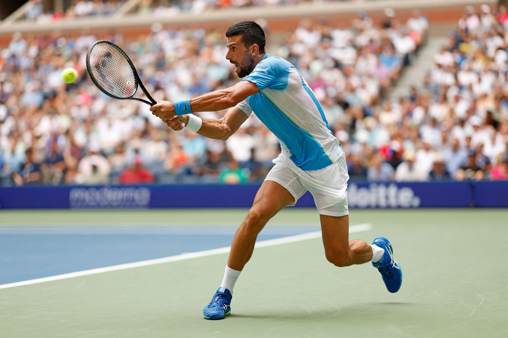 Novak Djokovic hits a backhand during the 2023 US Open.