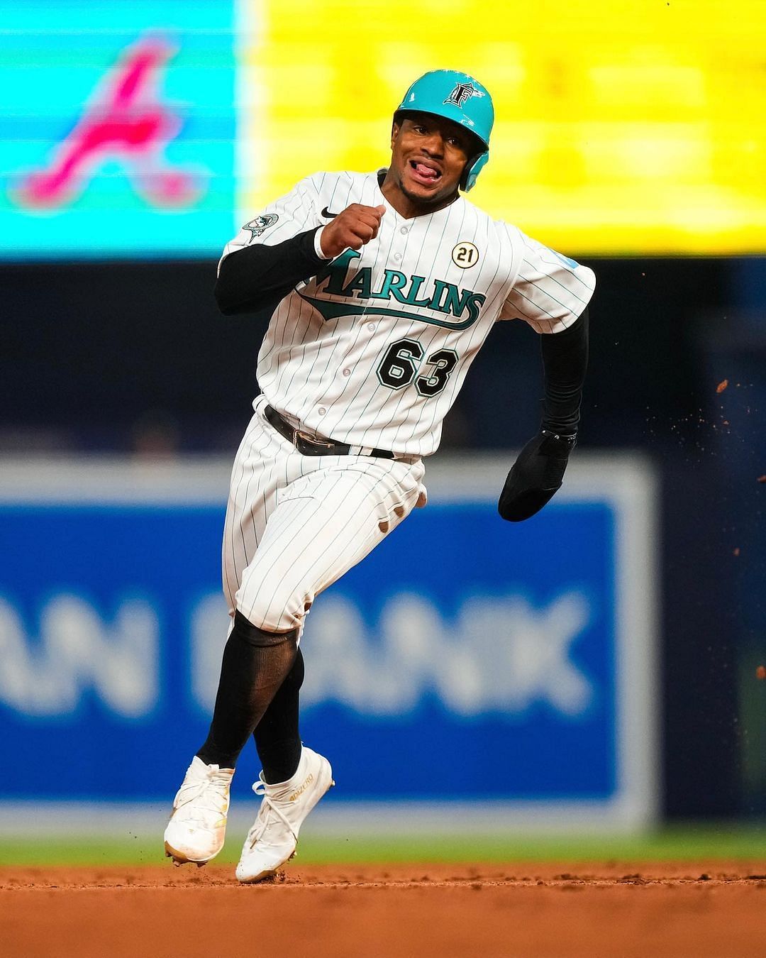 A.J. Puk of the Miami Marlins celebrates with Brant Brown hitting