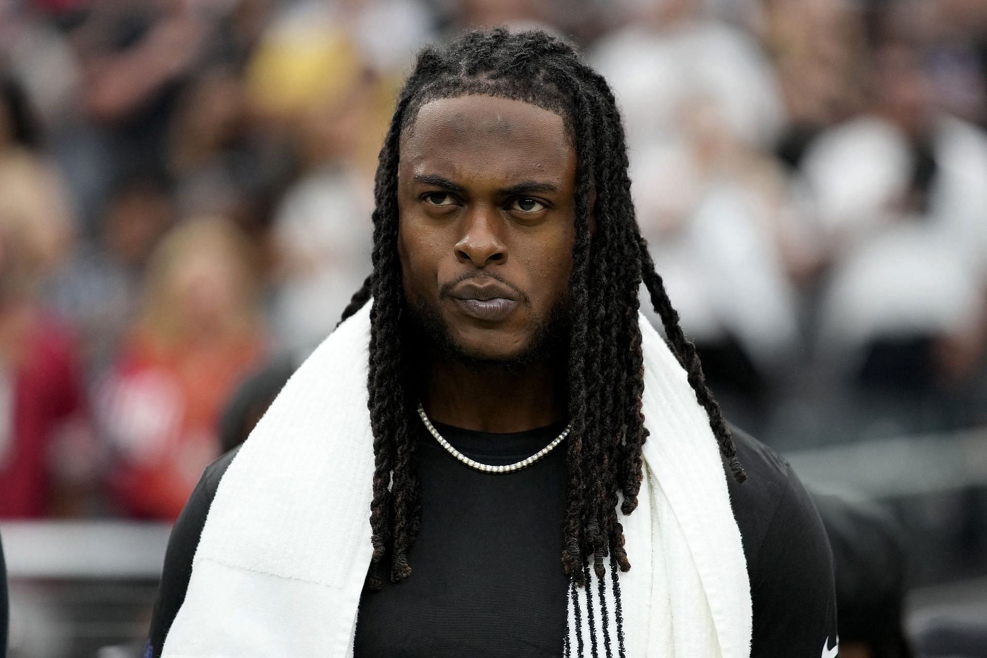 Davante Adams looks on from the sidelines vs San Francisco