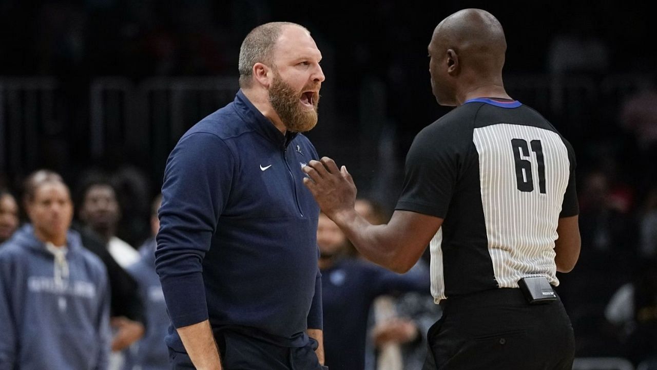 Memphis Grizzlies head coach Tyler Jenkins shouting at an official.