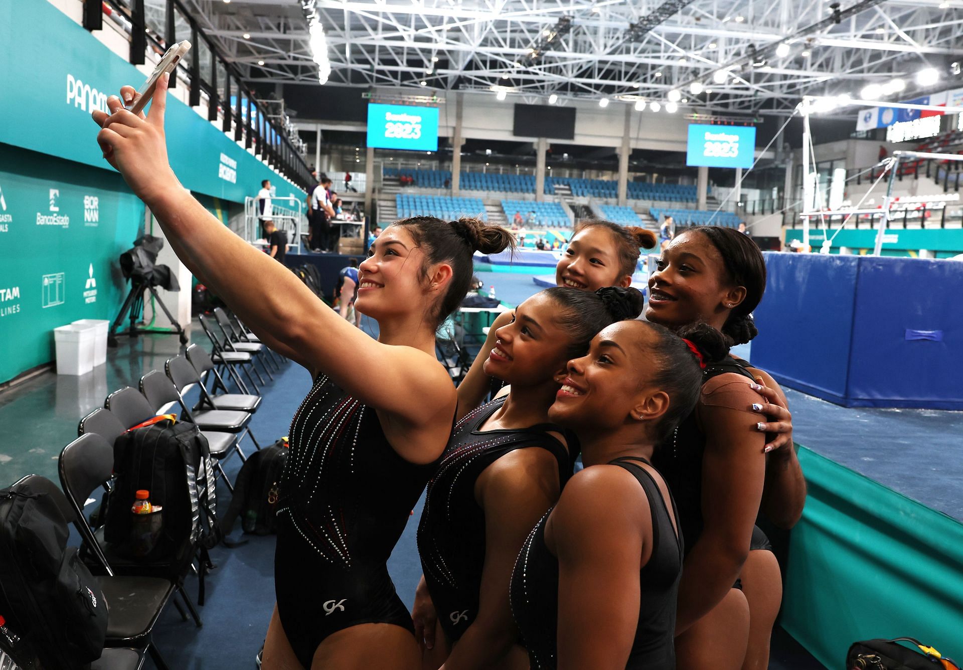 Kayla DiCello and Team USA pose for a selfie after a training session at the 2023 Pan American Games in Santiago, Chile.