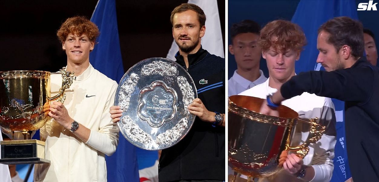 Daniil Medvedev grabbing a plushie from Jannik Sinner