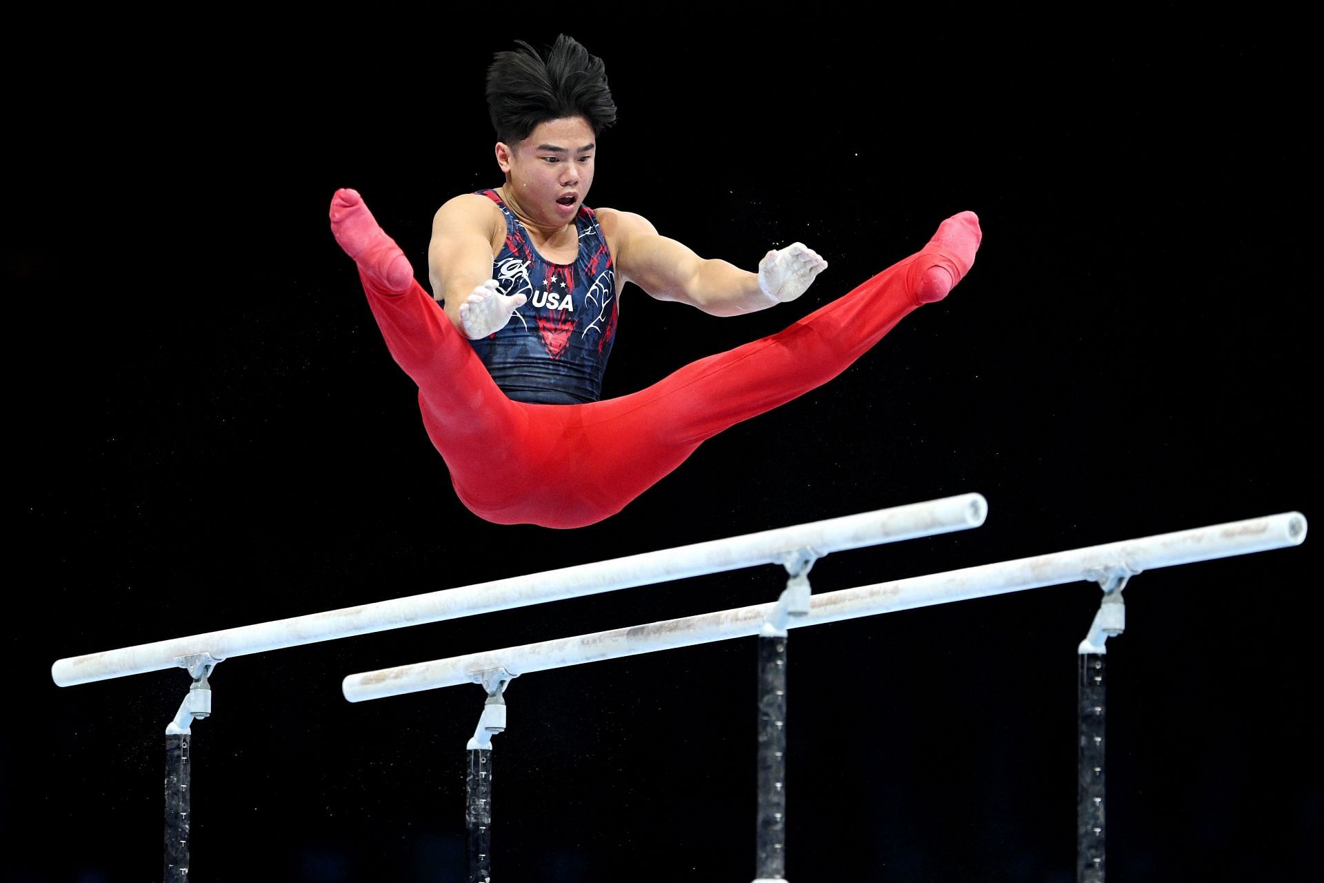 Asher Hong competes in the men&#039;s qualifications for the parallel bars during the 2023 World Artistic Gymnastics Championships in Antwerp, Belgium