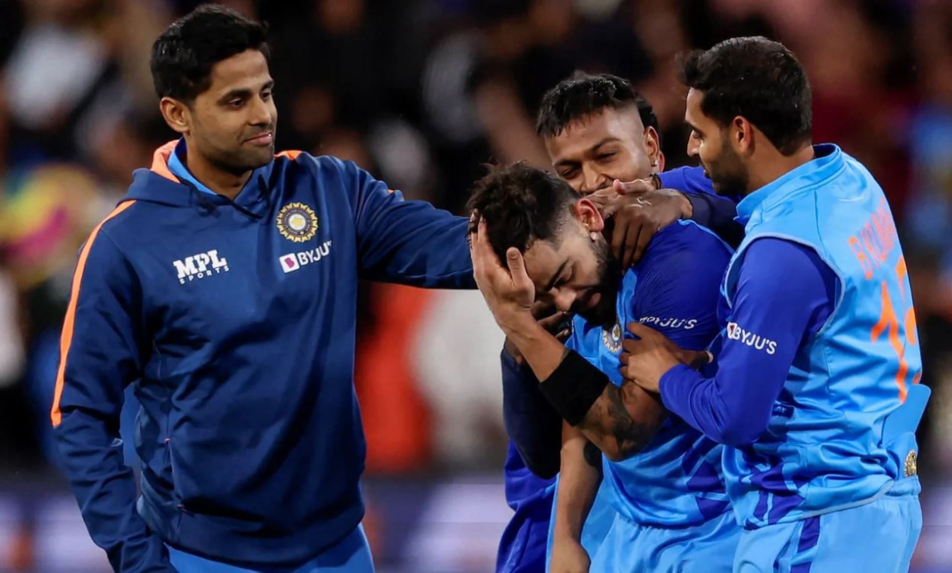An emotional Kohli was mobbed by teammates after the win.