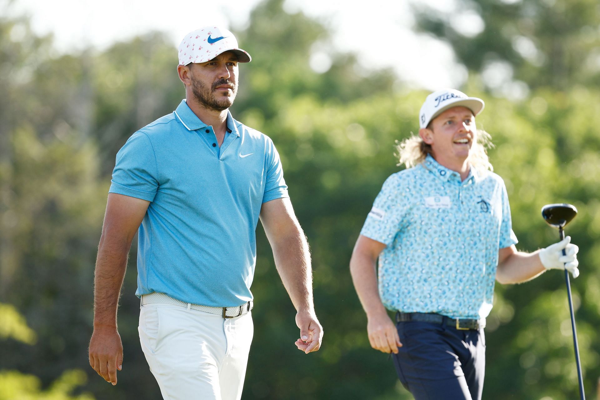 Cam Smith and Brooks Koepka on the course