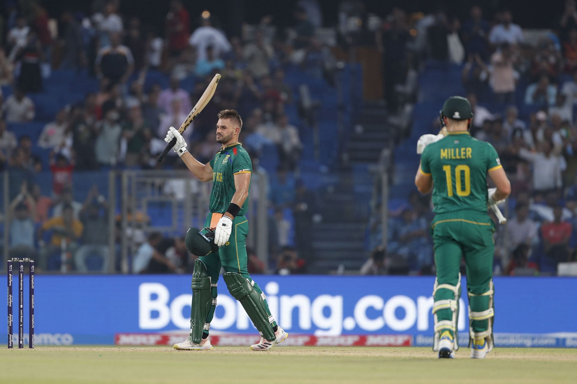 Aiden Markram raising his bat after a superlative century during the SA vs SL - ICC Men&#039;s Cricket World Cup 2023