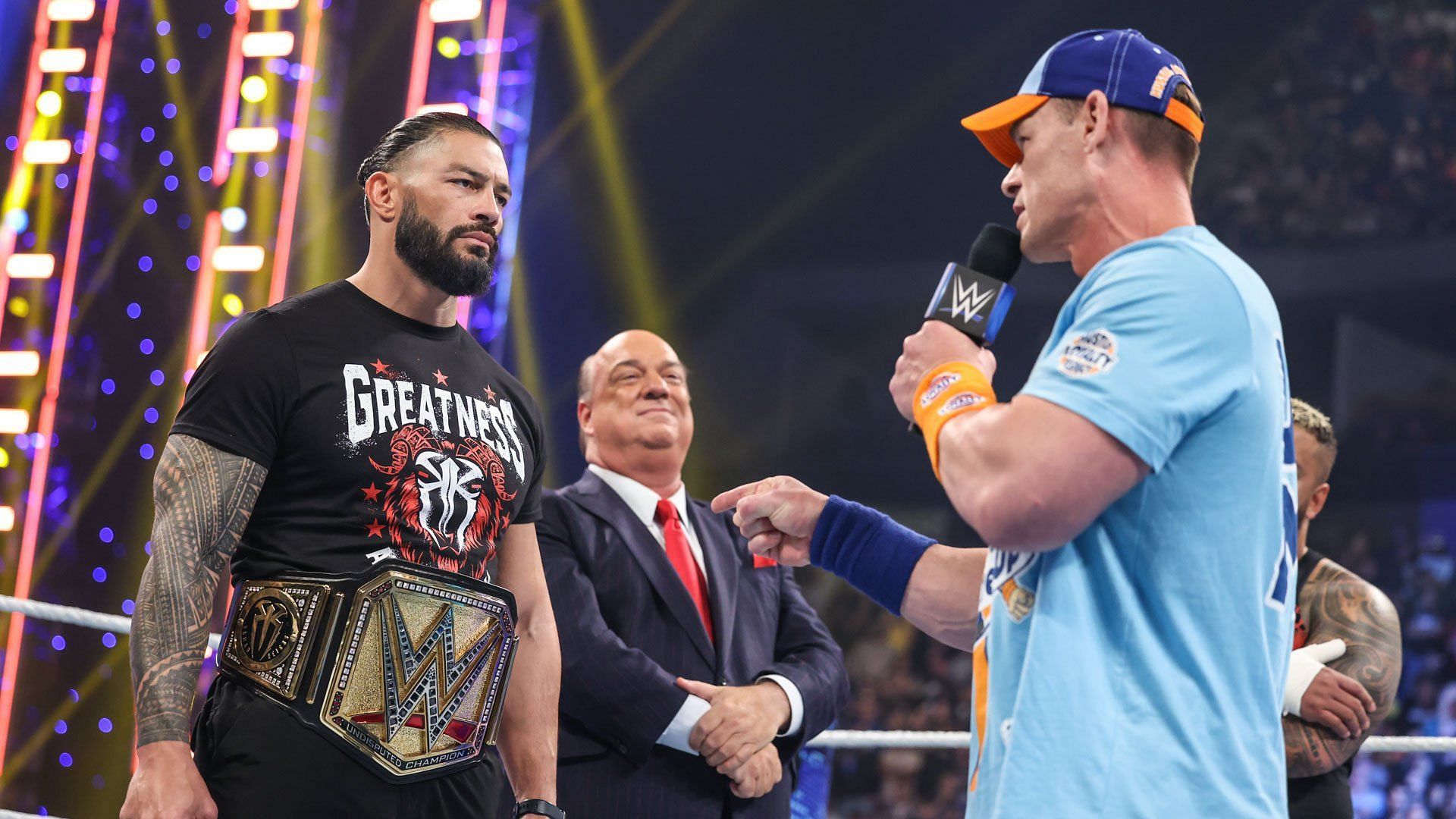 John Cena, Roman Reigns, and Paul Heyman