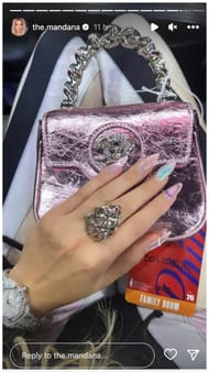 Pat Beverley's partner, Mandana Bolourchi, flashes her accessories