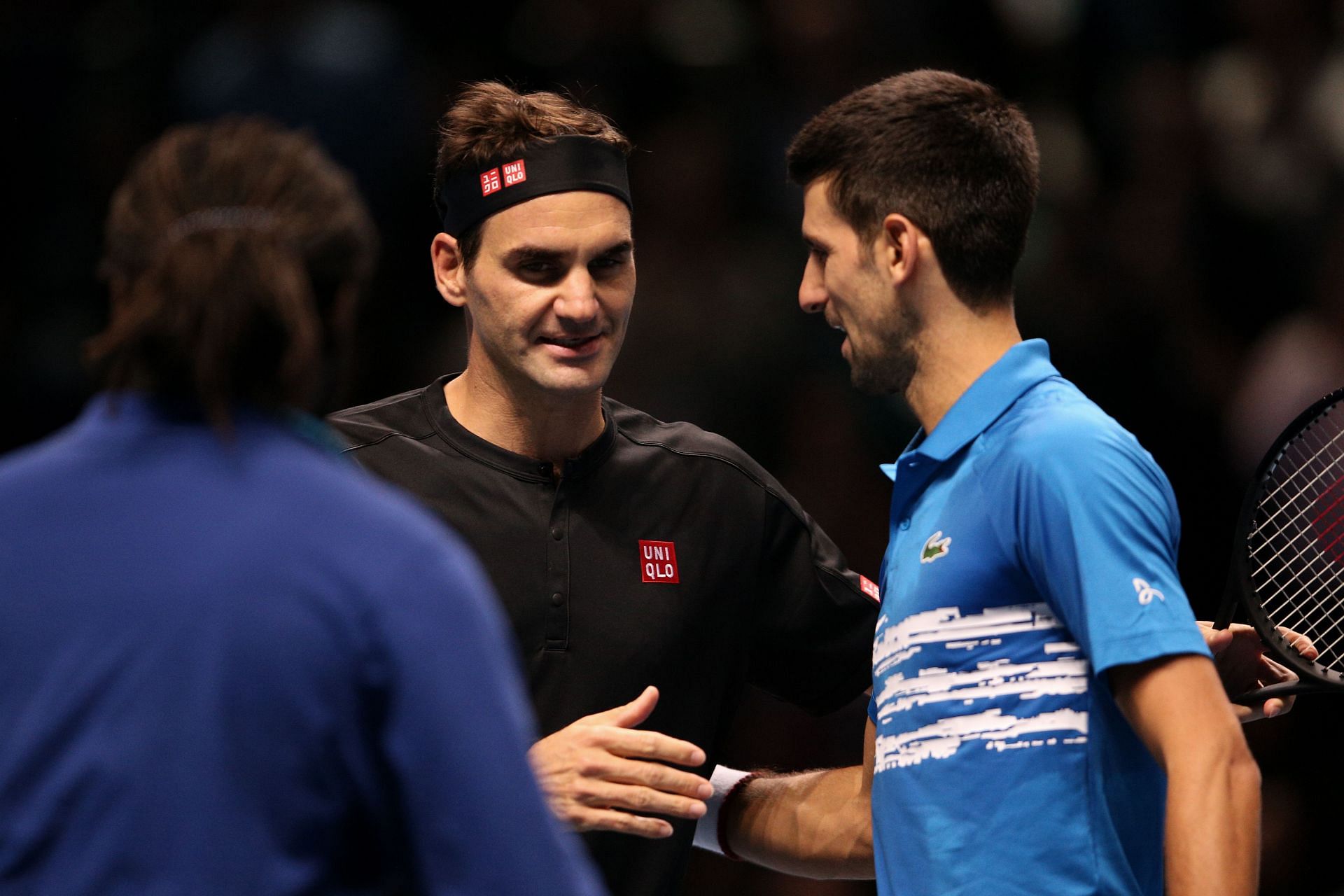 Novak Djokovic and Roger Federer after their match at the 2019 ATP Finals